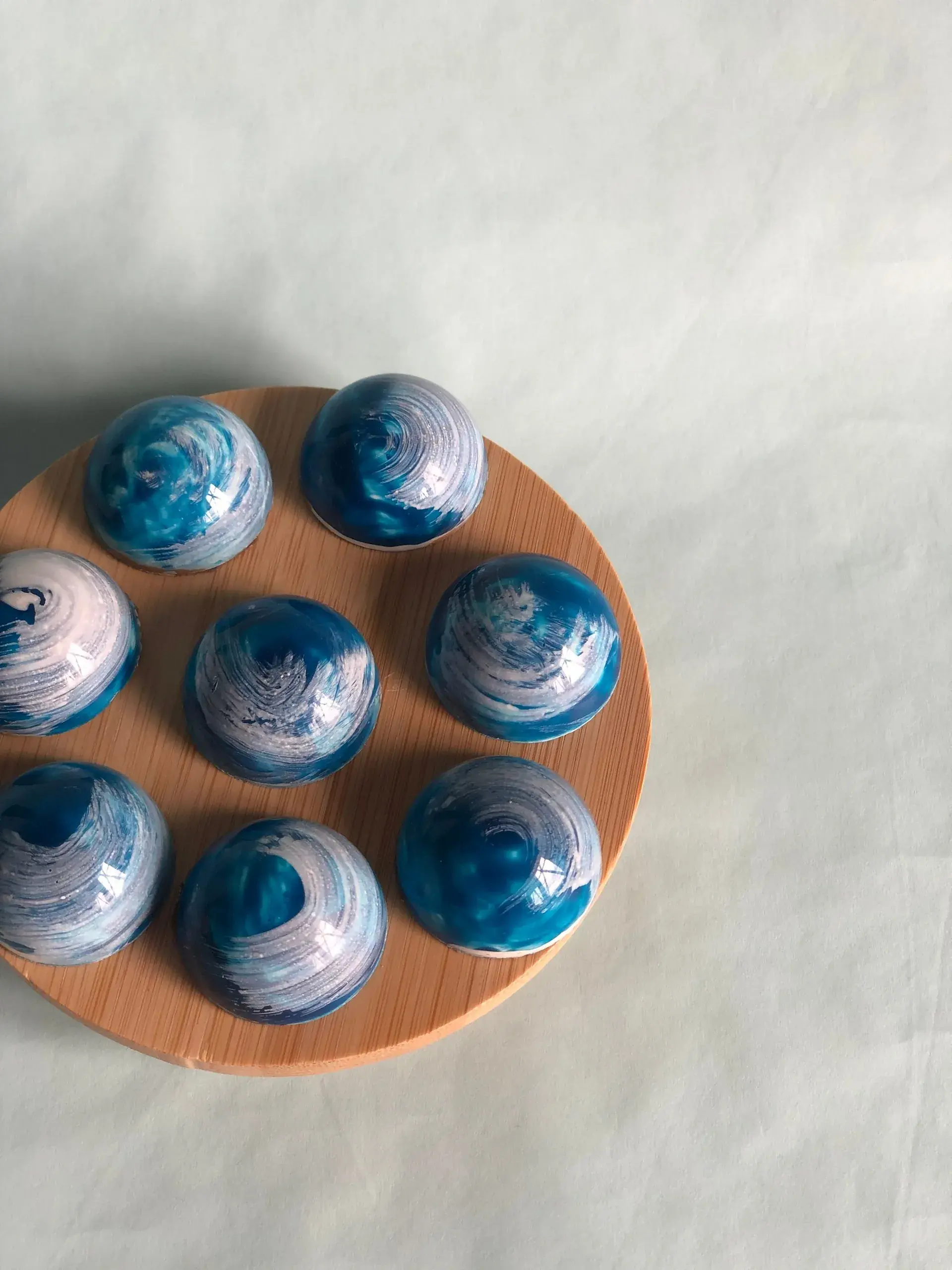 Chocolate truffles on a wooden board